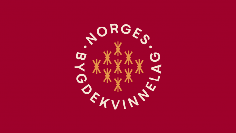 Norges Bygdekvinnelags logo på mørk rød bakgrunn